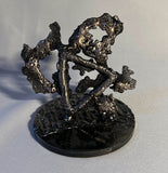 Sculpture de Philippe Buil qui représente le symbole de l'eau à travers la dentelle de métal (Acier et Bronze)