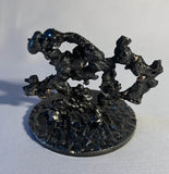 Sculpture de Philippe Buil qui représente le symbole de l'eau à travers la dentelle de métal (Acier et Bronze)