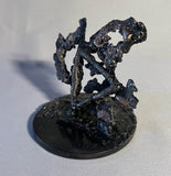 Sculpture de Philippe Buil qui représente le symbole de l'eau à travers la dentelle de métal (Acier et Bronze)