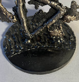 Sculpture de Philippe Buil qui représente le symbole de l'eau à travers la dentelle de métal (Acier et Bronze)