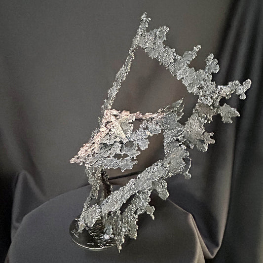 sculpture géométrique acier et bronze diamant