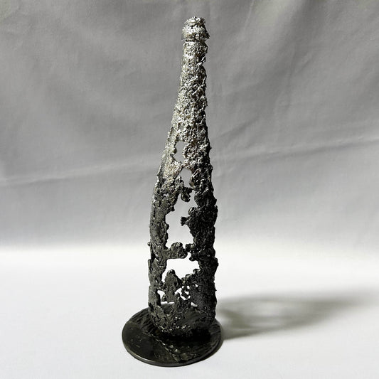 bouteille vin en dentelle de métal ajourée