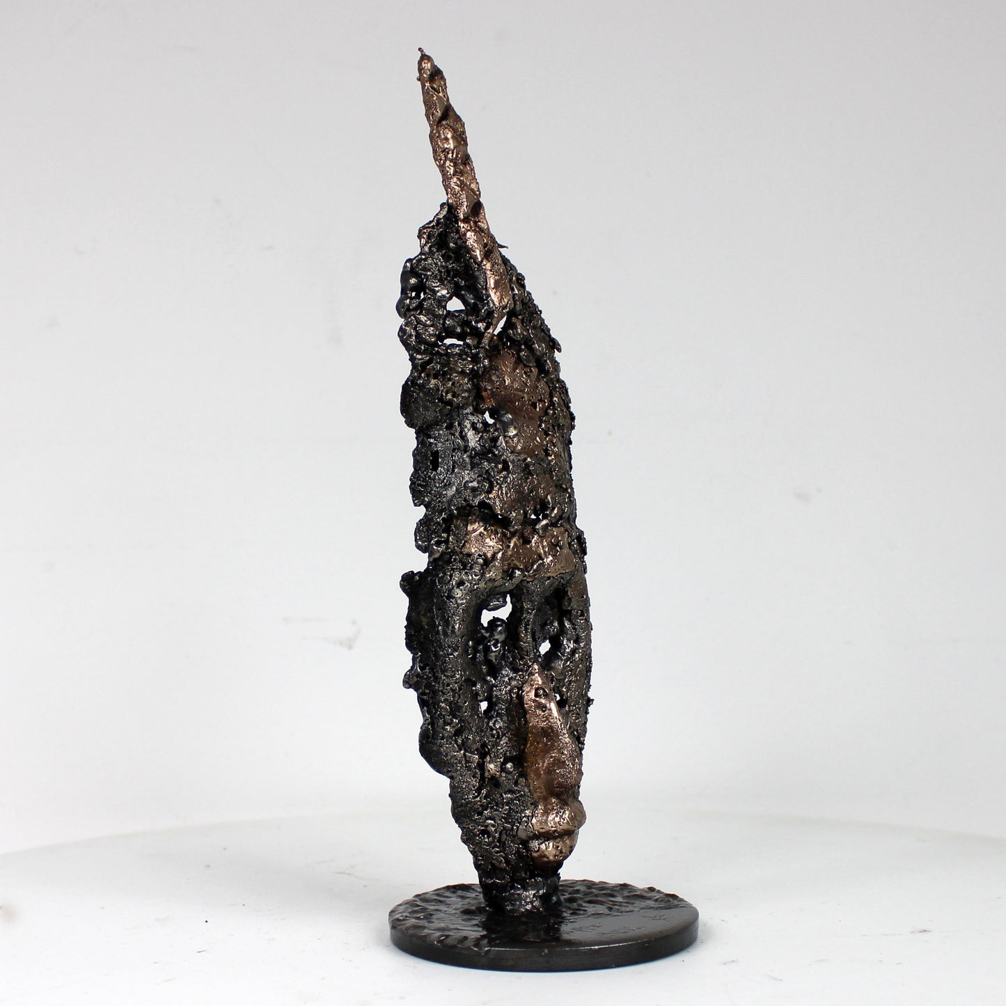 Sculpture visage africain stylisé acier bronze - vue de profil