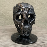 Crane 78-23 - Sculpture tete de mort métal dentelle acier et bronze