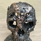 Crane 78-23 - Sculpture tete de mort métal dentelle acier et bronze